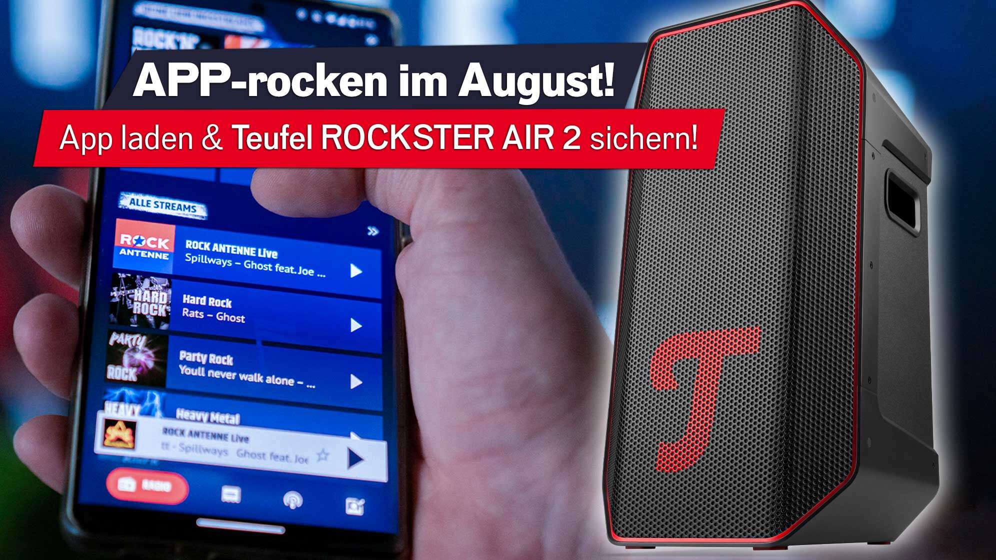 Ein großer Lautsprecher der Marke Teufel - schwarz mit rotem T. Im Hintergrund sieht man ein Smartphone, das die ROCK ANTENNE App geöffnet hat.