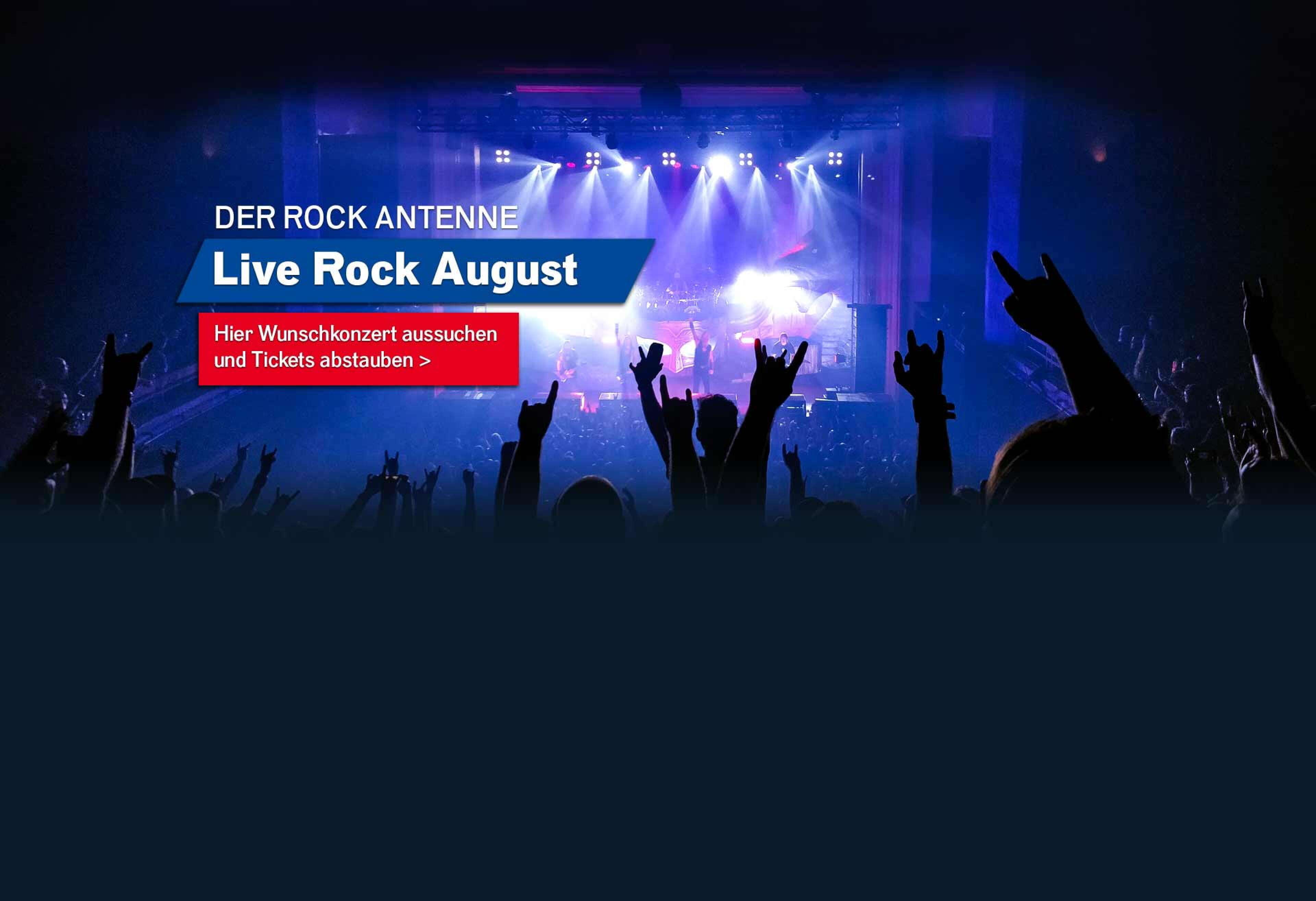 Bild eines Konzert-Publikums mit Blick auf die Bühne mit Aufschrift ROCK ANTENNE Live Rock August - hier Wunschkonzert aussuchen und Tickets abstauben!